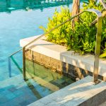 outdoor-swimming-pool-with-stair-ladder-around-there